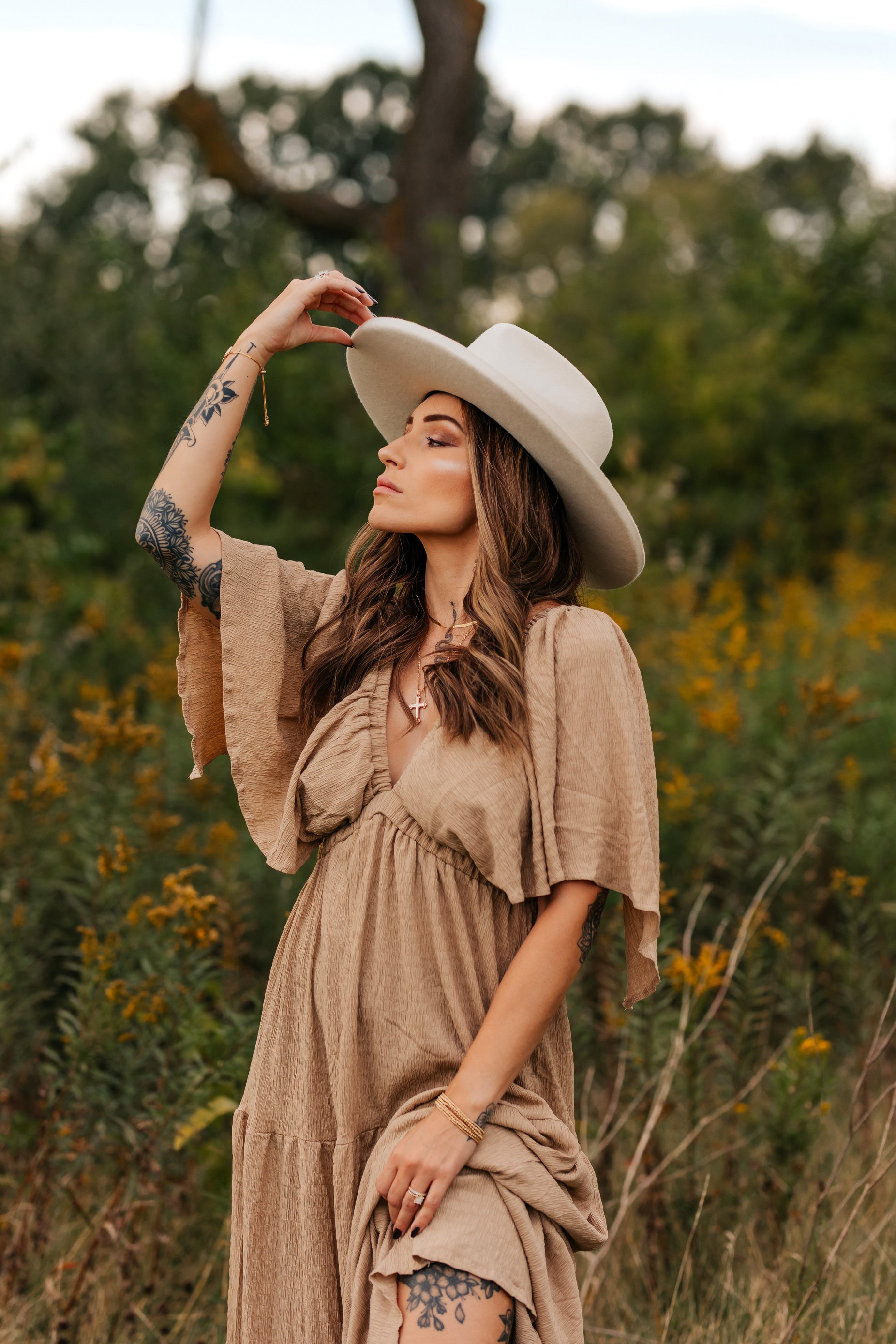 Balayage wig worn with a hat