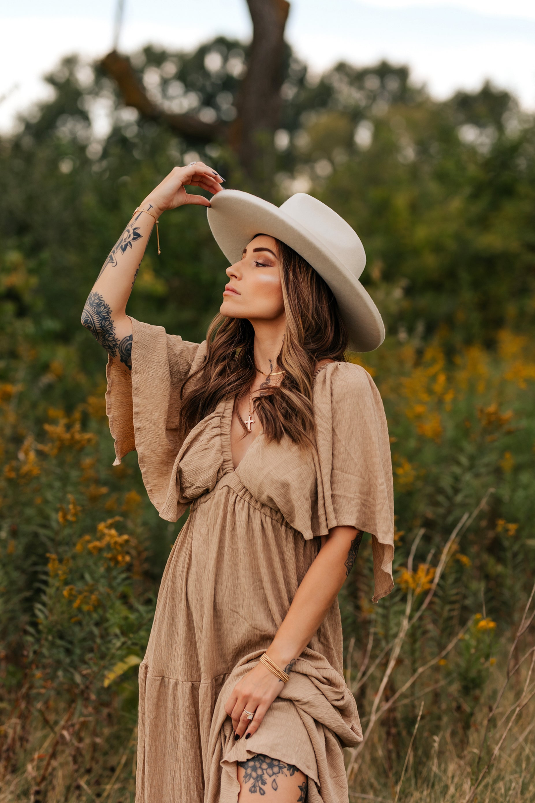 Balayage wig worn with a hat