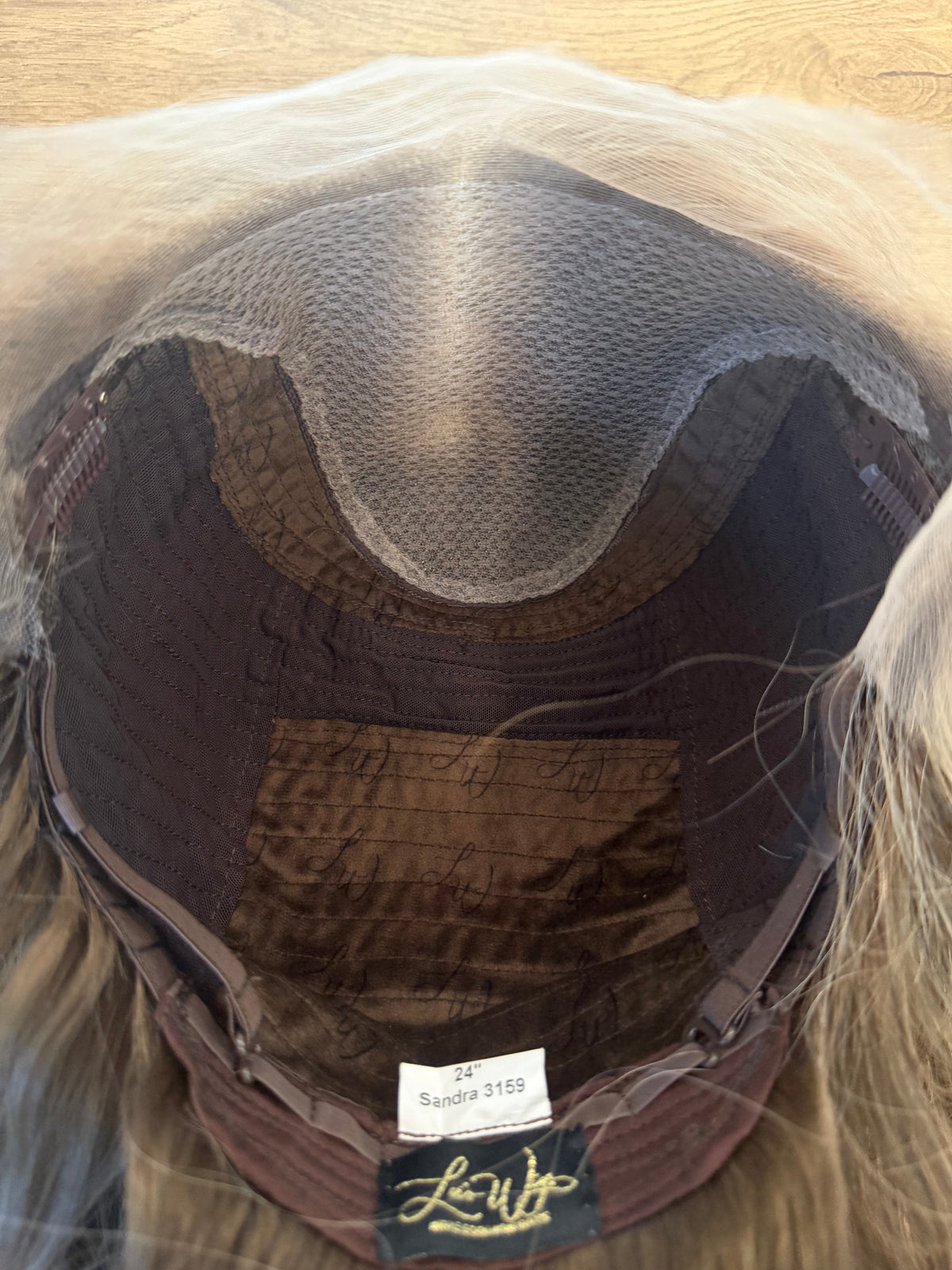 <b>Sandra</b><br><u>L</u> <br> <l>Signature Mongolian Collection</l> <br> 24” Lace Top Wig