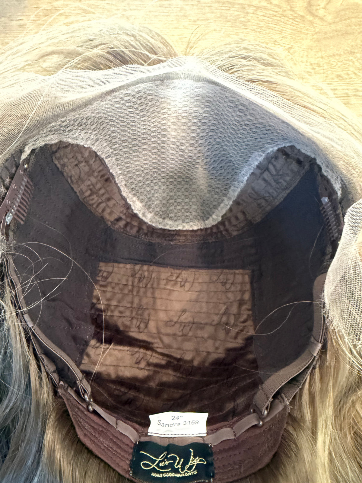 <b>Sandra</b><br><u>M</u> <br> <l>Signature Mongolian Collection</l> <br> 24” Lace Top Wig