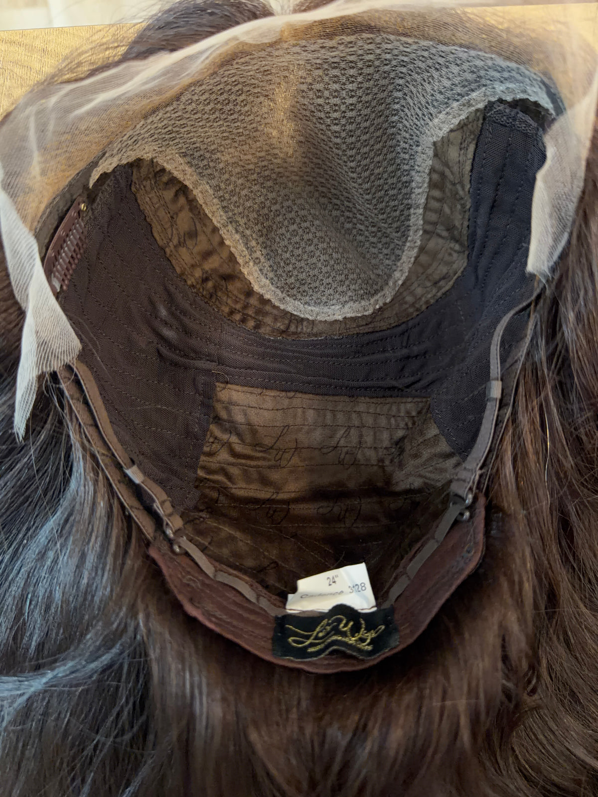 <b>Cadence</b><br><u>L</u> <br> <l> Signature Mongolian Collection </l> <br> 24” Lace Top Wig